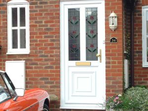 White front door with two decorative glass panels
