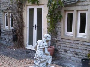 French doors opening onto the patio- modern patio doors