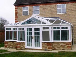 T-shape conservatory in white uPVC