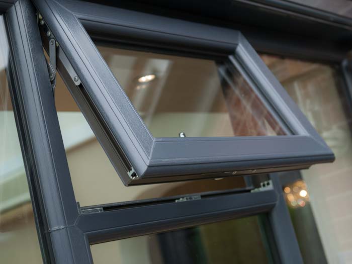 uPVC windows in grey woodgrain finish