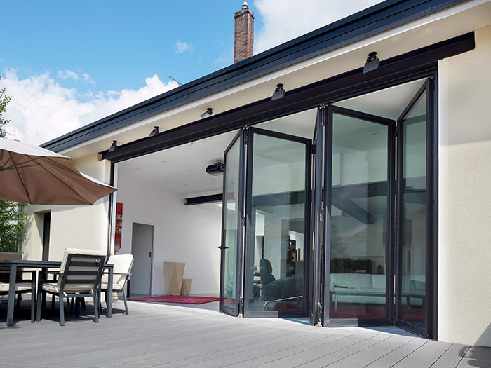 Black aluminum bifold doors opening 