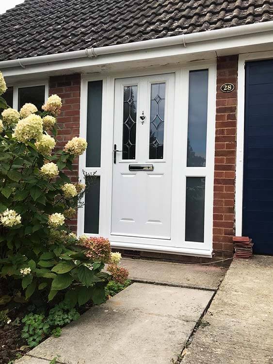 Cosy bungalow with a white upvc front door