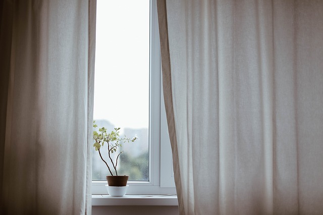 Cream curtains and white window