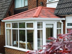 Conservatory with red solid roof.