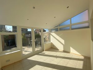 Inside a new extension with sunlight flooding in.