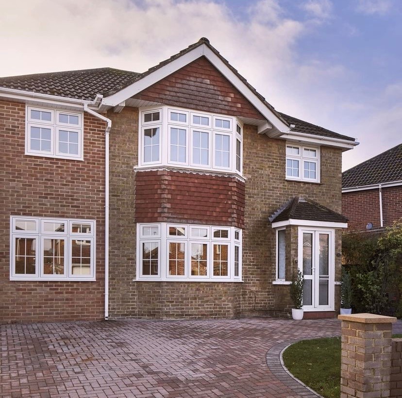 brick house with white windows 