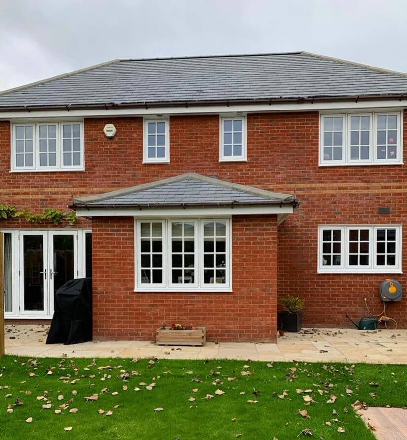 Front of house with white uPVC windows