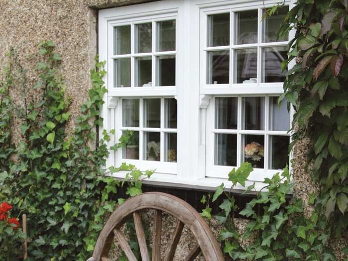 Vertical sliding sash windows in white uPVC