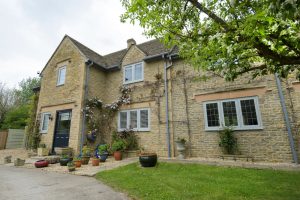 A photo of a historic property with flush sash windows, a popular feature of the period 