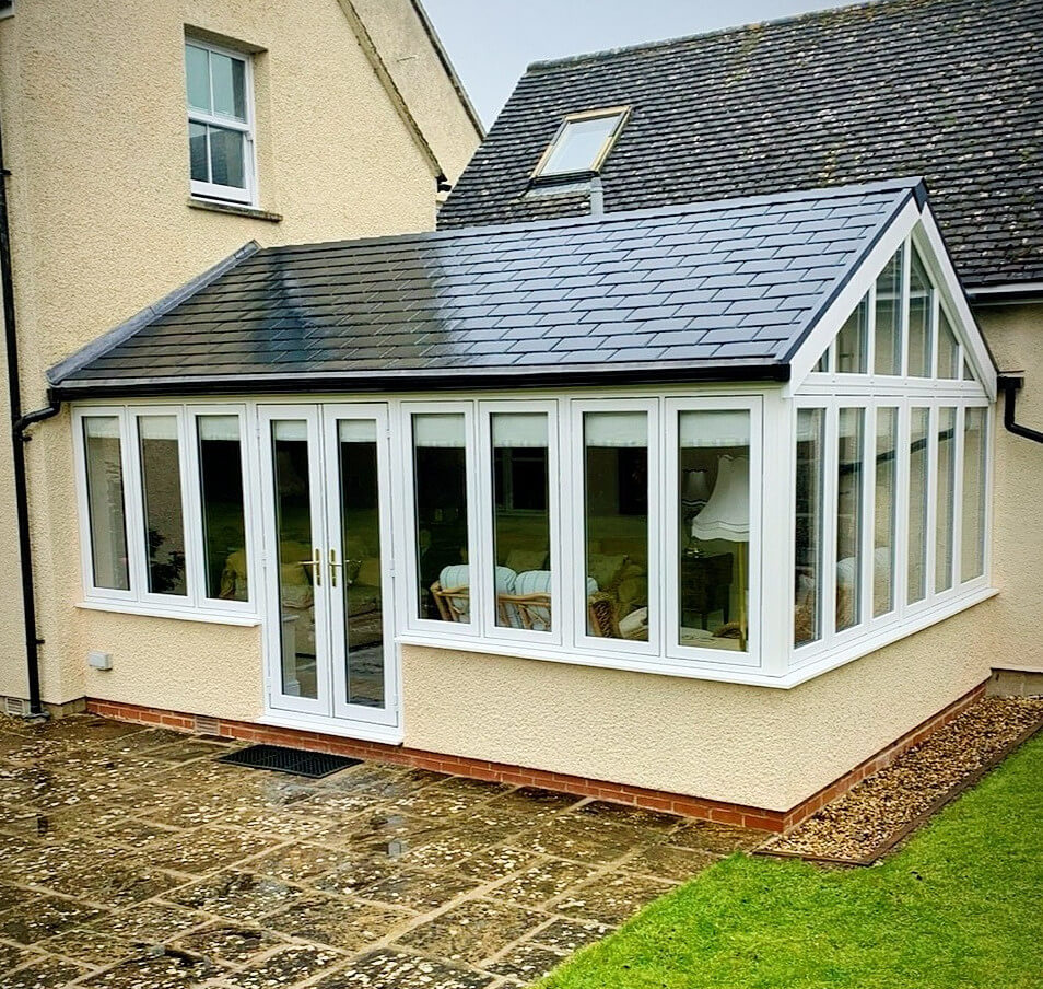 A house extension with French doors leading to a patio